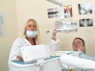 Excellent teen busty blonde dentist films her boobs to a patient